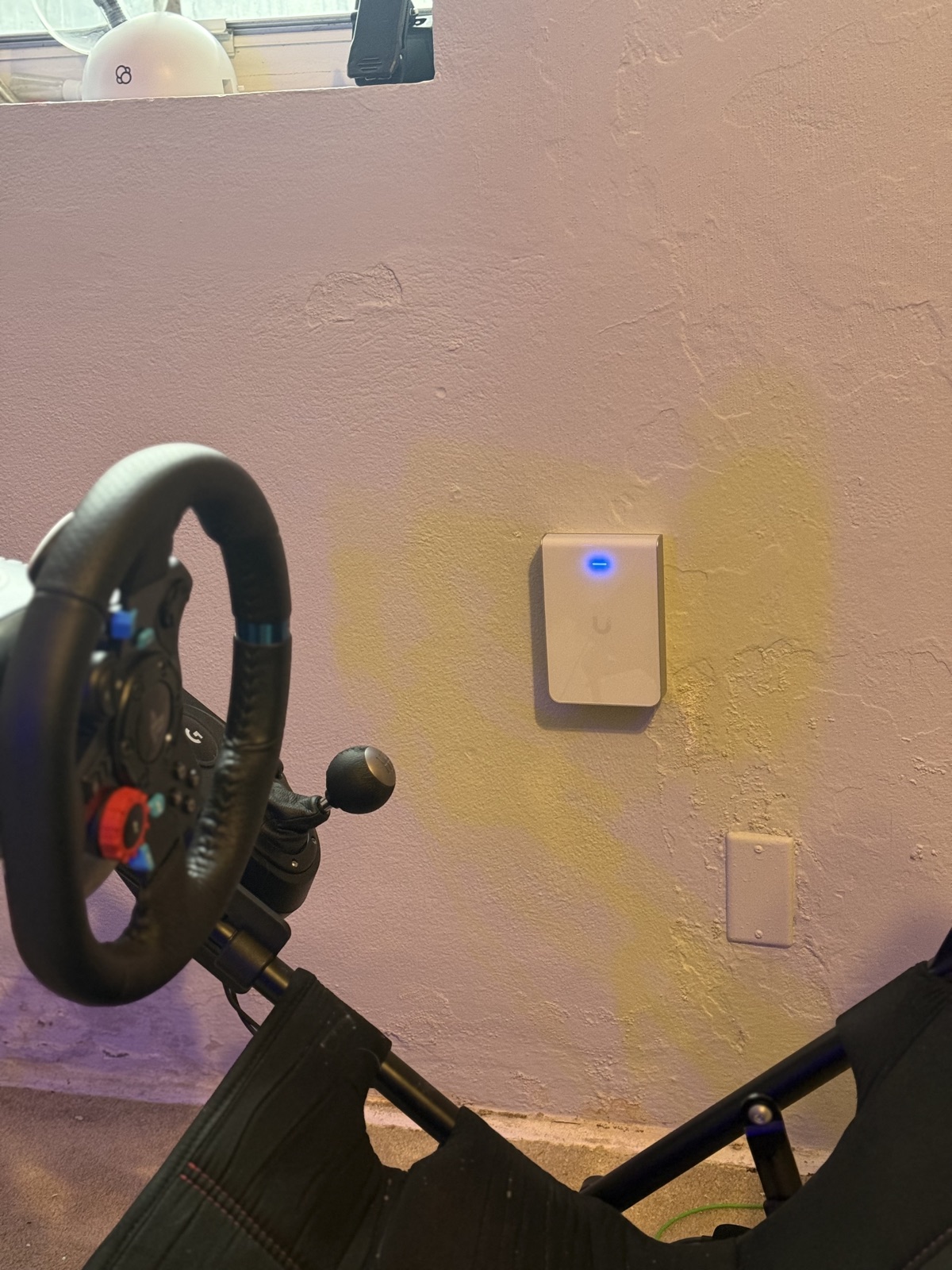 In-wall access point above the sim rig - lag-free gaming WiFi