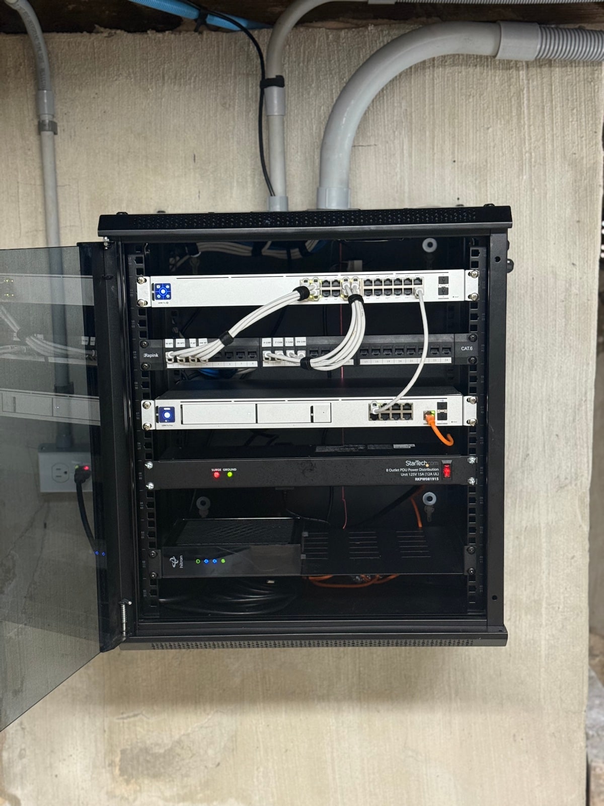 Tidy rack interior - switches, UPS, and cable management