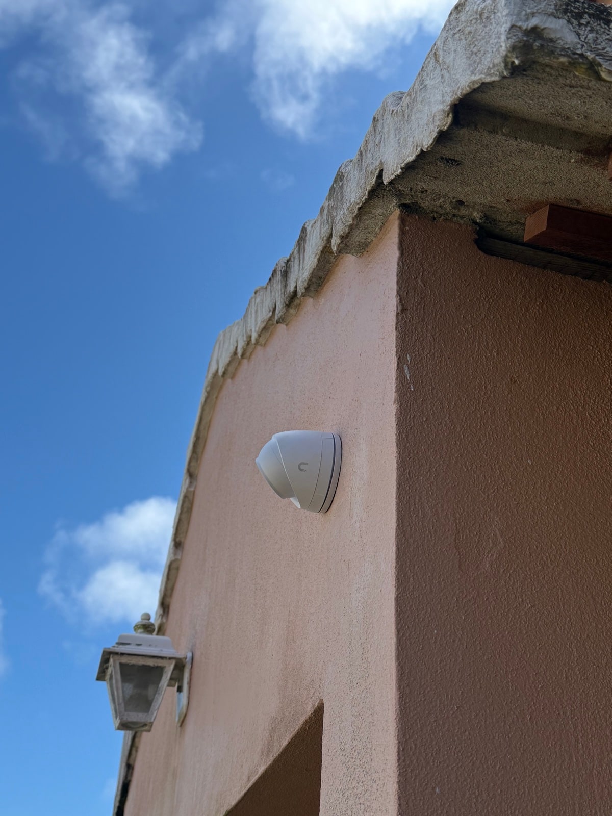 Wedge-style camera at a corner-mount position