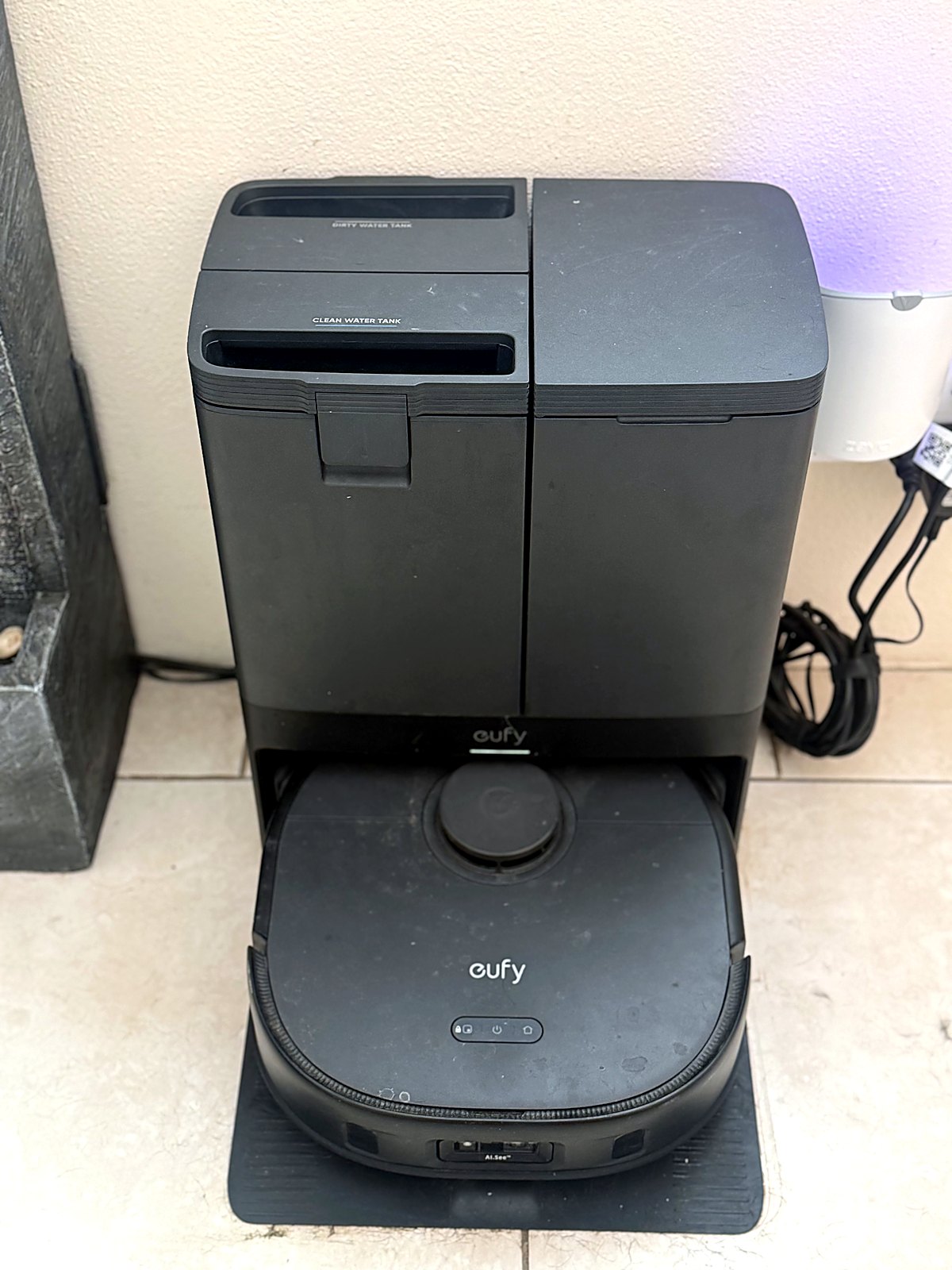 Robot vacuum with self-emptying dock - scheduled daily cleans